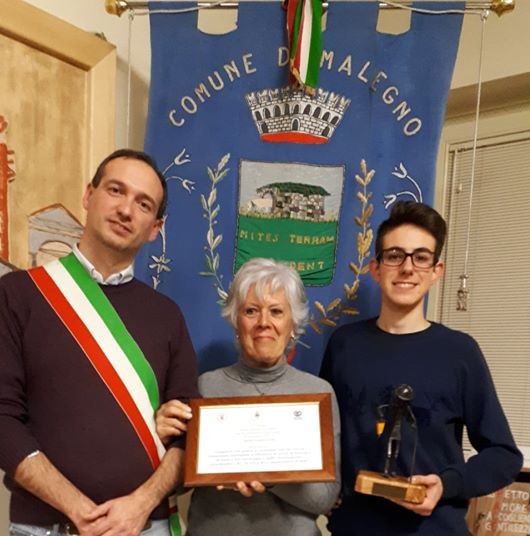 Paolo Erba, Elisabetta Panteghini, promotrice della candidatura, ed il nipote di don Lino Zani